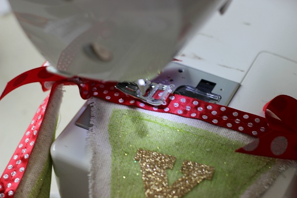 DIY Christmas Drop Cloth Banner made with iron on heat vinyl