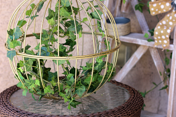 Repurposed Iron Baskets into Garden Decor
