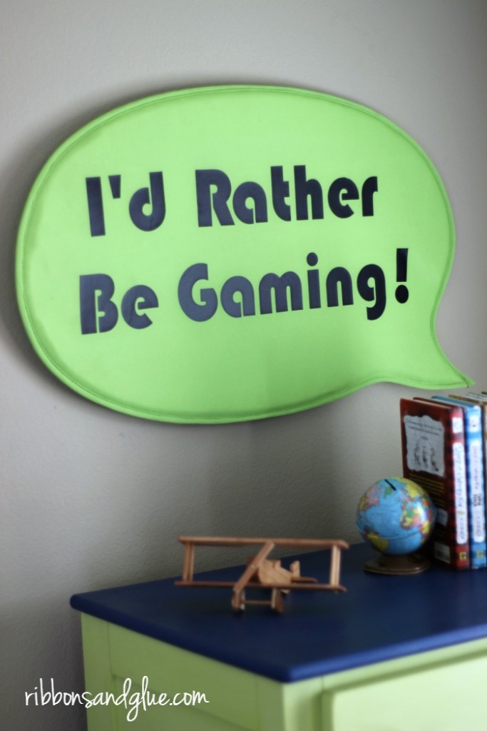 DIY I'd Rather Be Gaming Sign made with heat transfer vinyl, Silhouette Cameo and an IKEA sign. Easy craft idea for any Tween Boys Room
