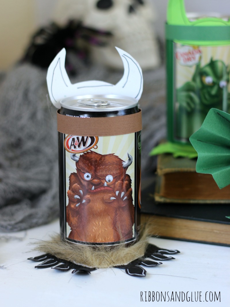 Halloween Mini Monster Soda Cans. Make the monsters come alive on Halloween Soda cans with googly eyes, fur, paper and fur. Fun Halloween Party activity.