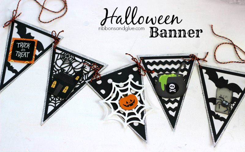 Easy Halloween Banner made from a pre-made banner embellished with Halloween stickers and shapes