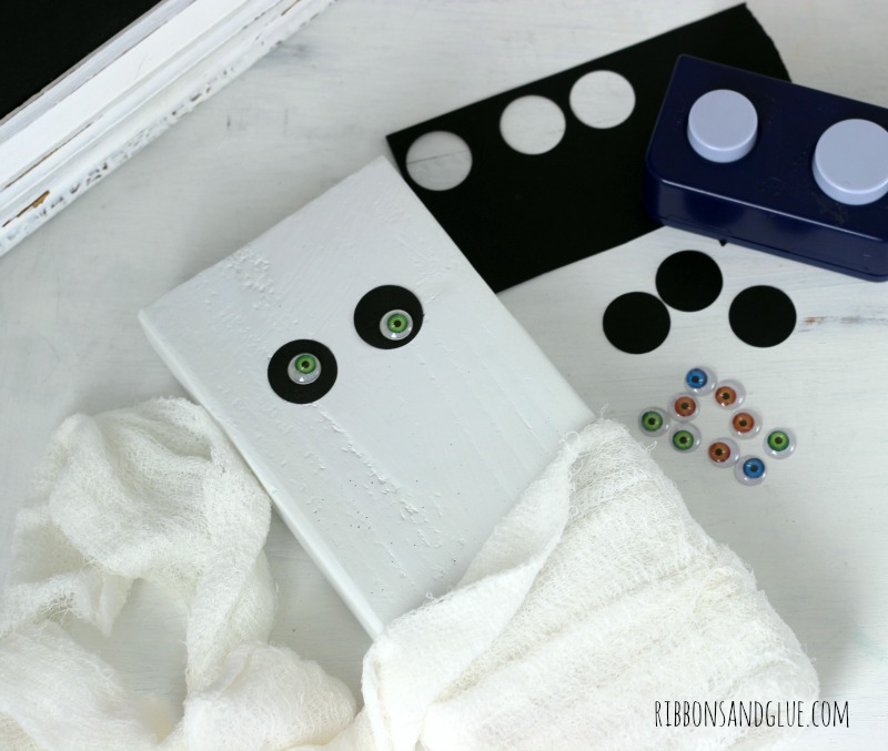 How to make a mummy out of a wood board and gauze