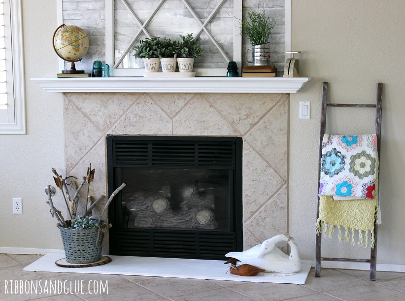 Simple and Temporary Fireplace Makeover using rempvable faux brick wallpaper from WallPops